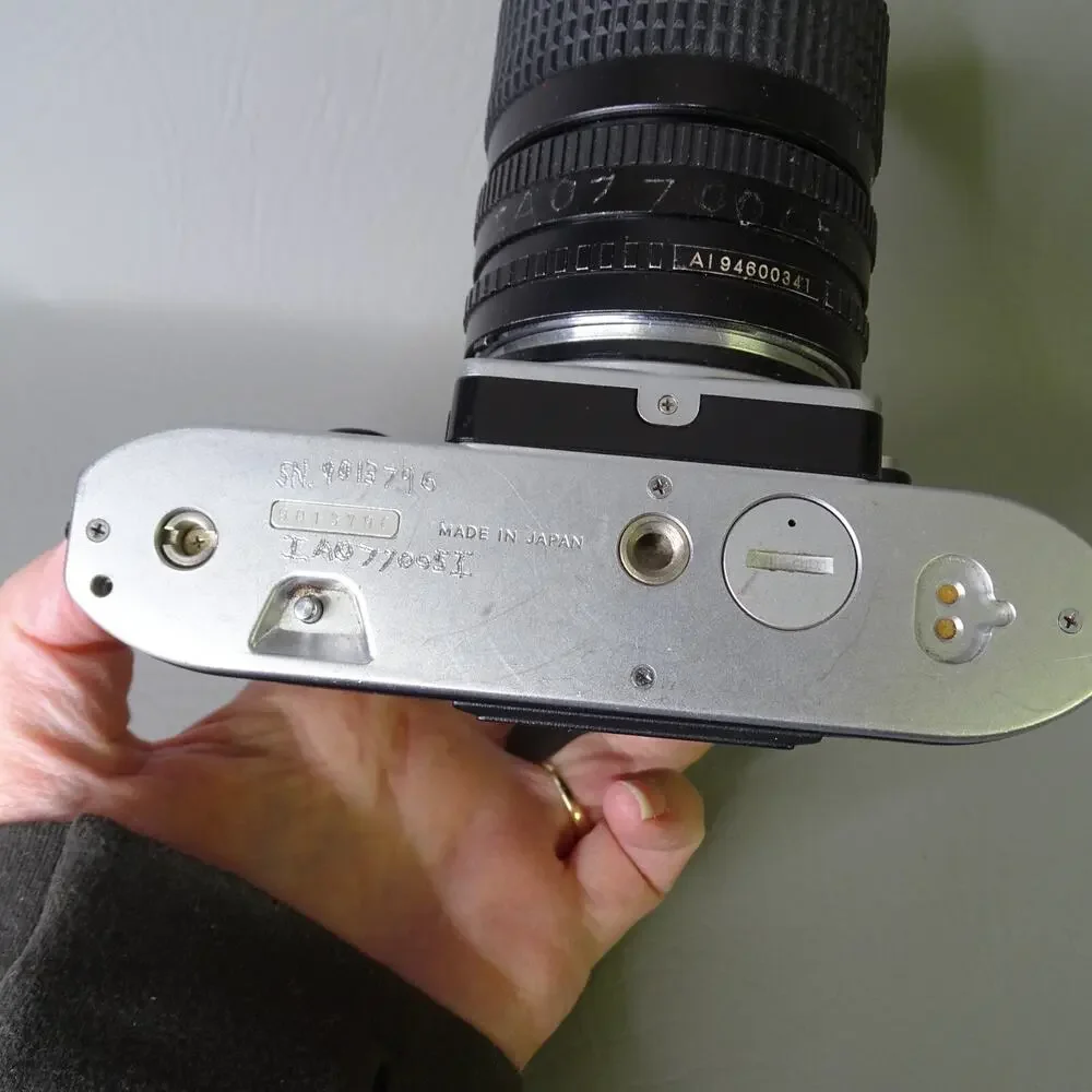 Nikon FG SLR Film Camera Chrome w/ Cosina 35-70 mm f3.5-4.5 MC Macro Lens
